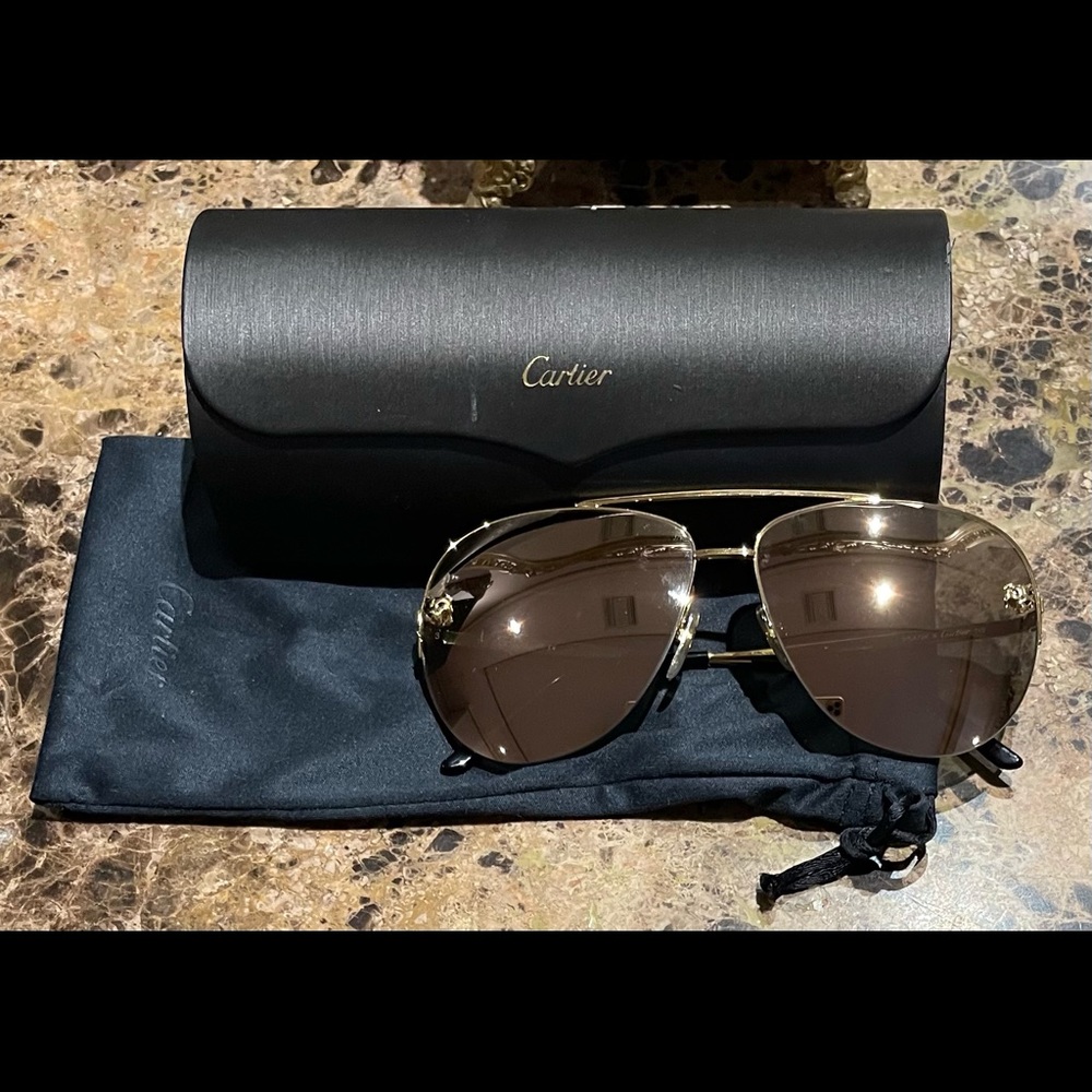 Panthère De Cartier sunglasses.